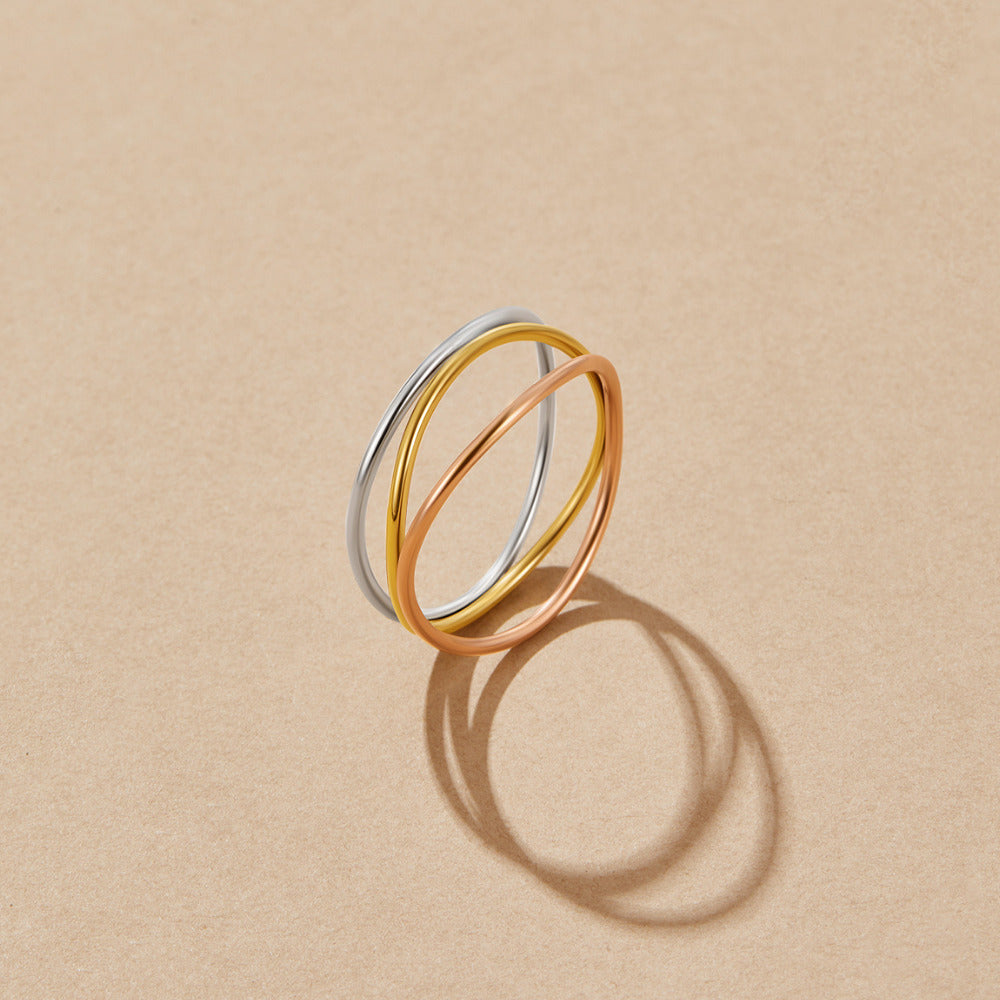 Ayla Three Toned Layered Ring, three thin interlocking bands in silver, gold and rose tones