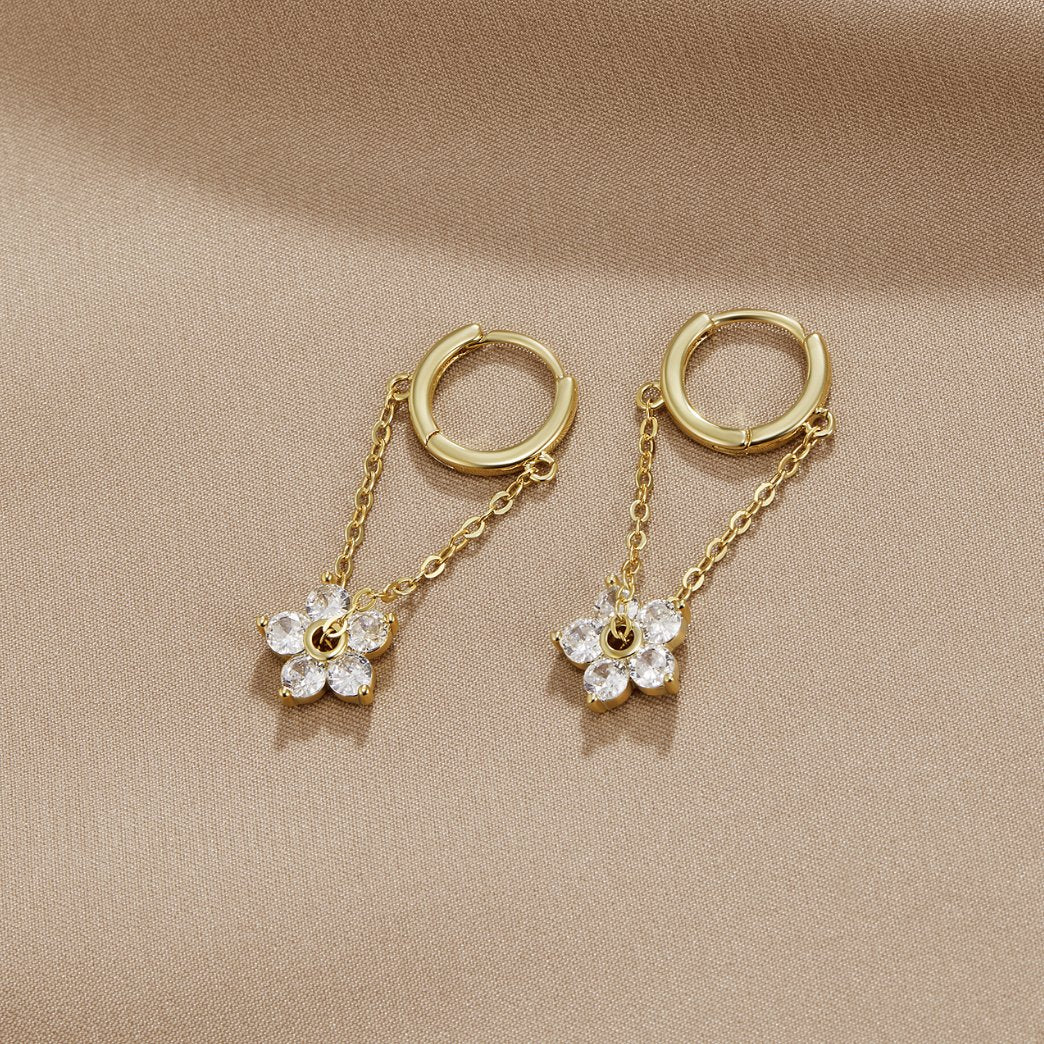 Blooming Petal Crystal Earrings, pair of gold hoops with chains and crystal flower drops on