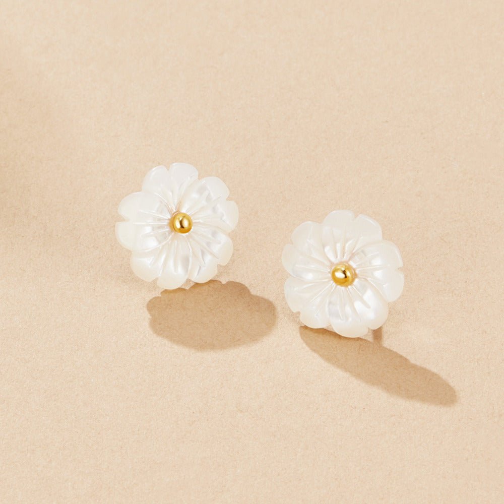 Blooming White Cherry Blossom Earrings, two carved white shell flower studs with gold centres