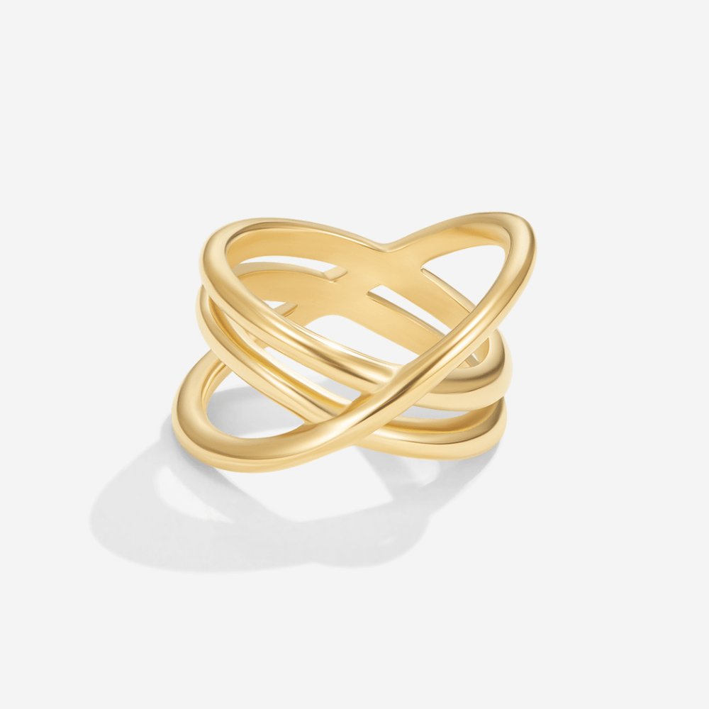 Brooke Infinity Loop Ring, gold ring with crossed interlocking bands on white background