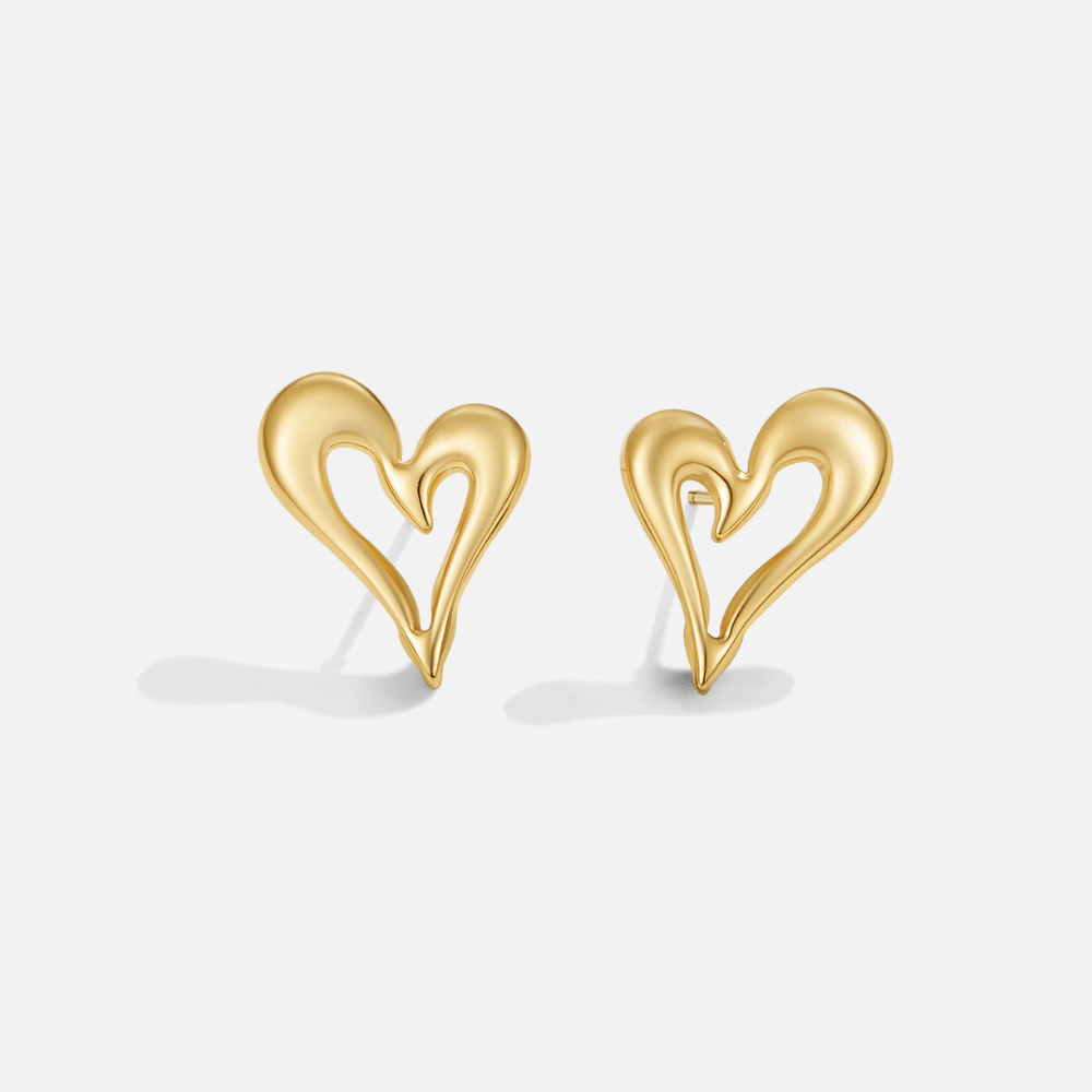 Celine Gold Heart Stud Earrings, pair of open, flowing gold heart studs on a plain white background