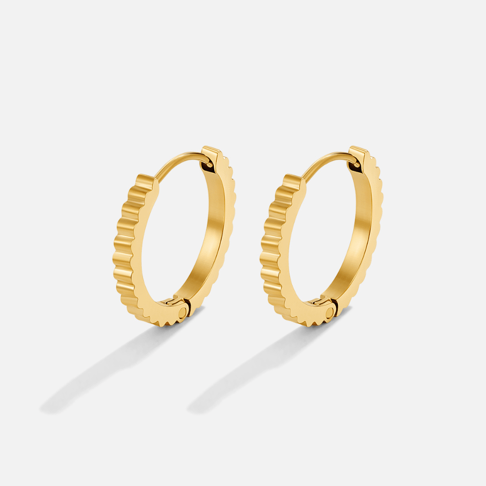 Dakota Mini Hoop Earrings, pair of gold hoops with ridged, fluted outer edges on white