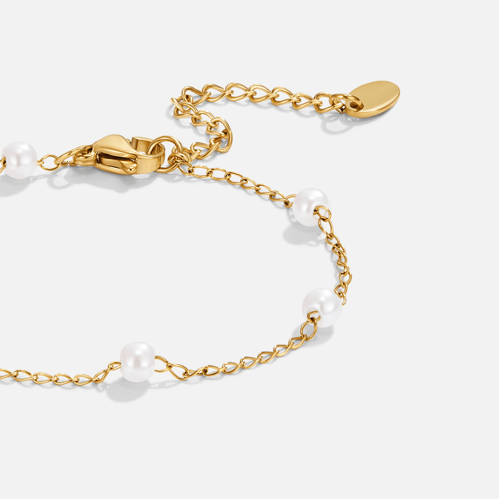 Nura Freshwater Pearl Bracelet, close-up of gold chain bracelet with pearls on white background