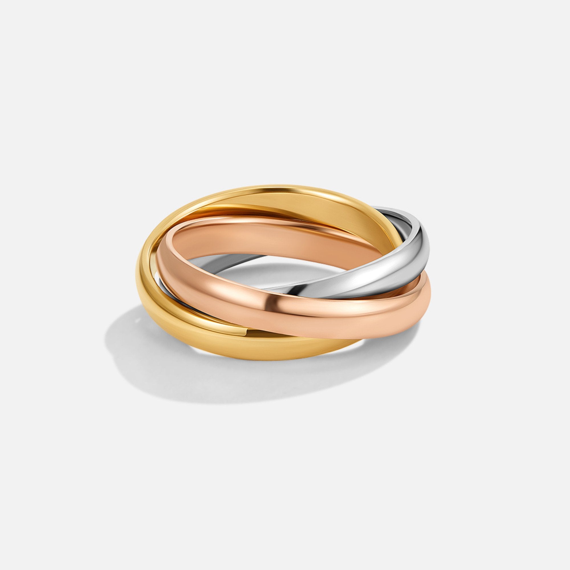 Elena Three-Toned Loop Ring, three interlinked bands in yellow, rose and white gold on white