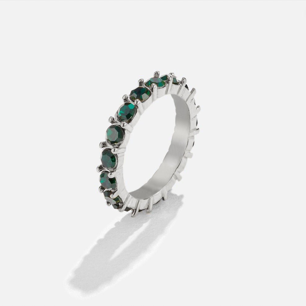 Emerald Beauty Silver Crystal Ring, standing upright on a white surface, green crystals in
