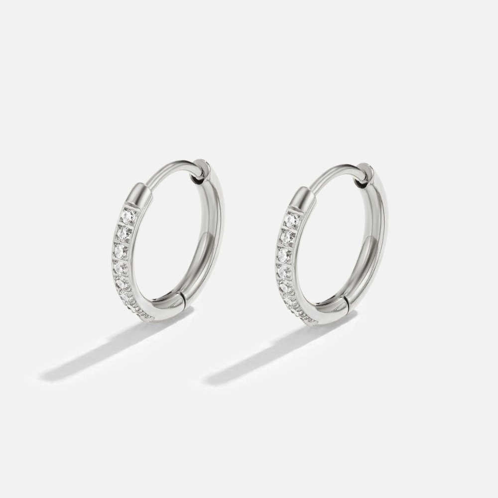 Eternity Hoop Earrings, pair of silver hoops with a row of small clear stones on one side