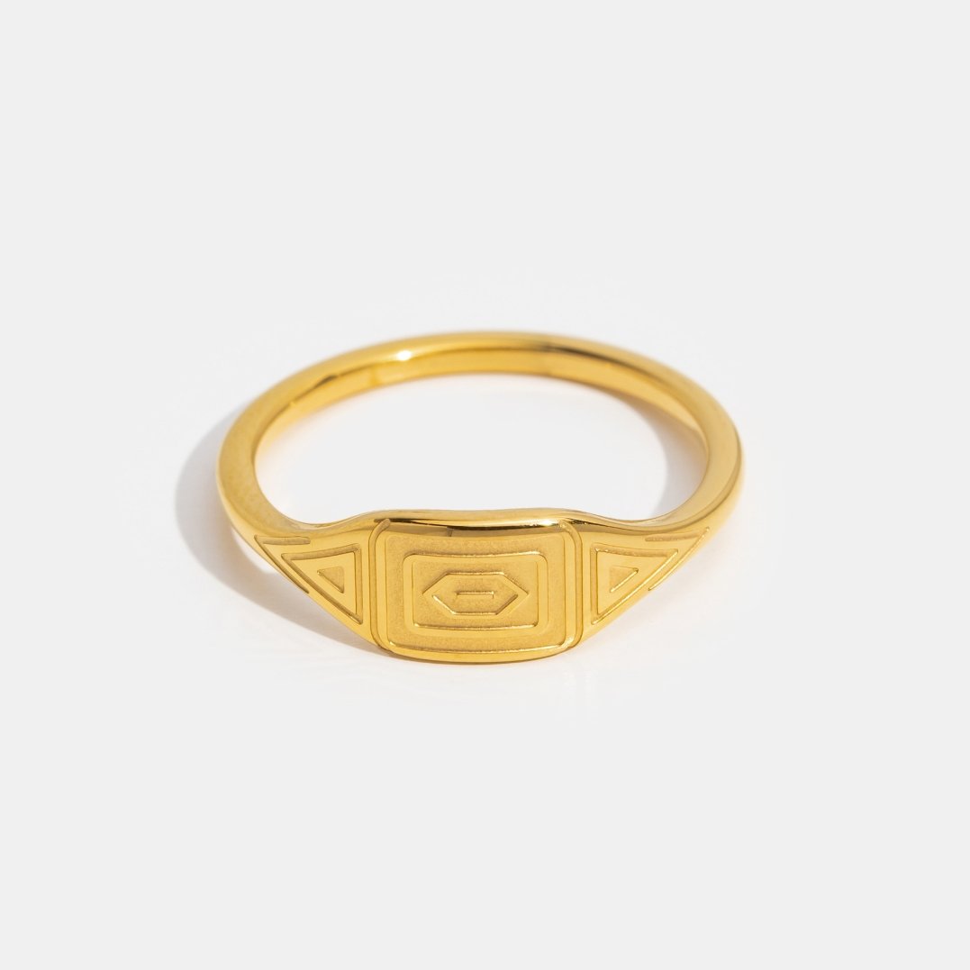 Gold Adaline Ring, gold ring on white background with engraved geometric face