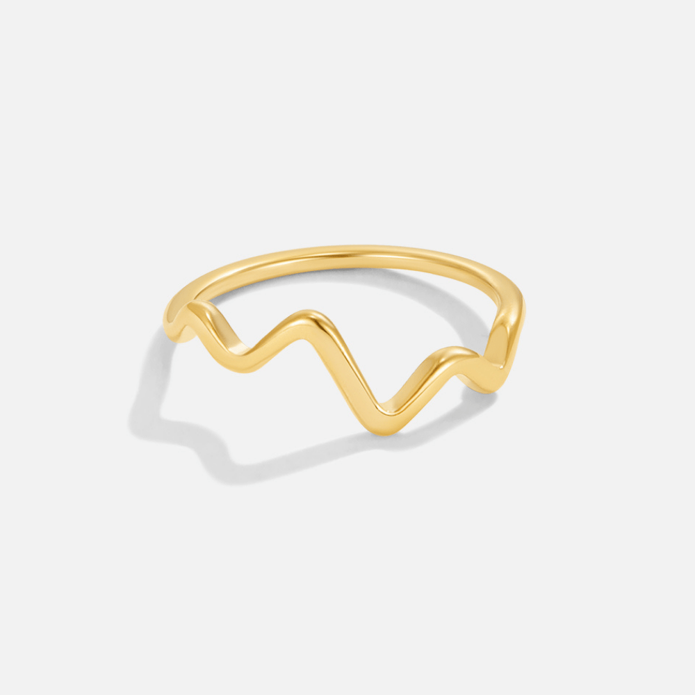 Gold Zoe Ring, gold ring with a wavy zigzag band on white background