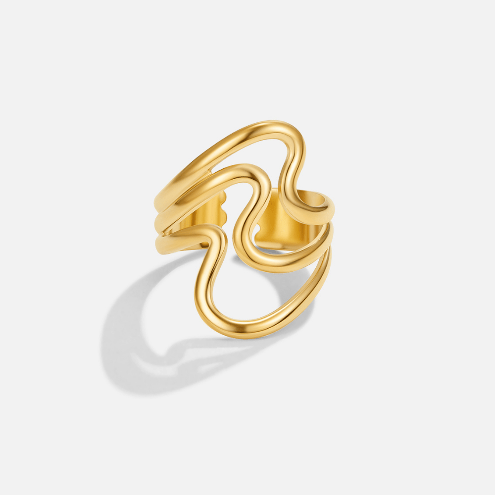 Golden Waves Wrap Ring, single gold ring with wavy, sculptural strands on a plain background