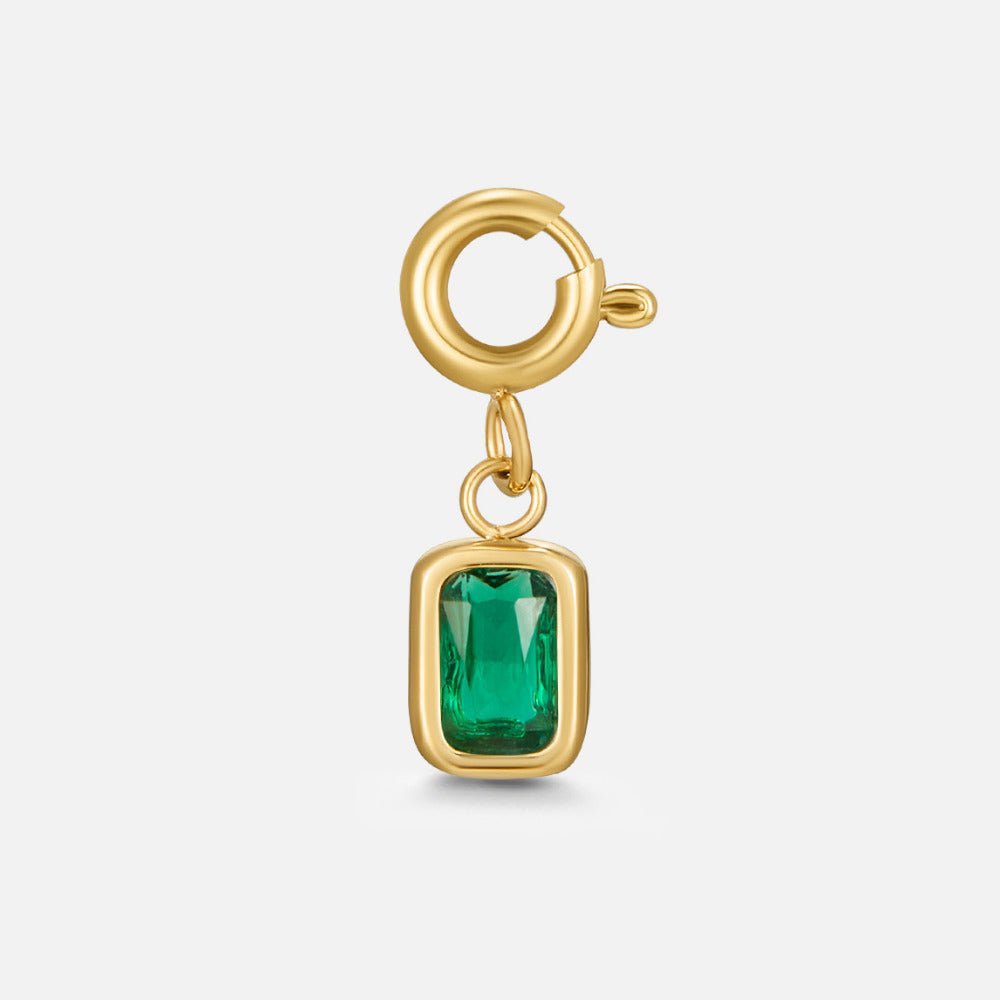 Green Emerald Crystal Charm, gold spring-clasp charm with a rectangular green crystal, on white