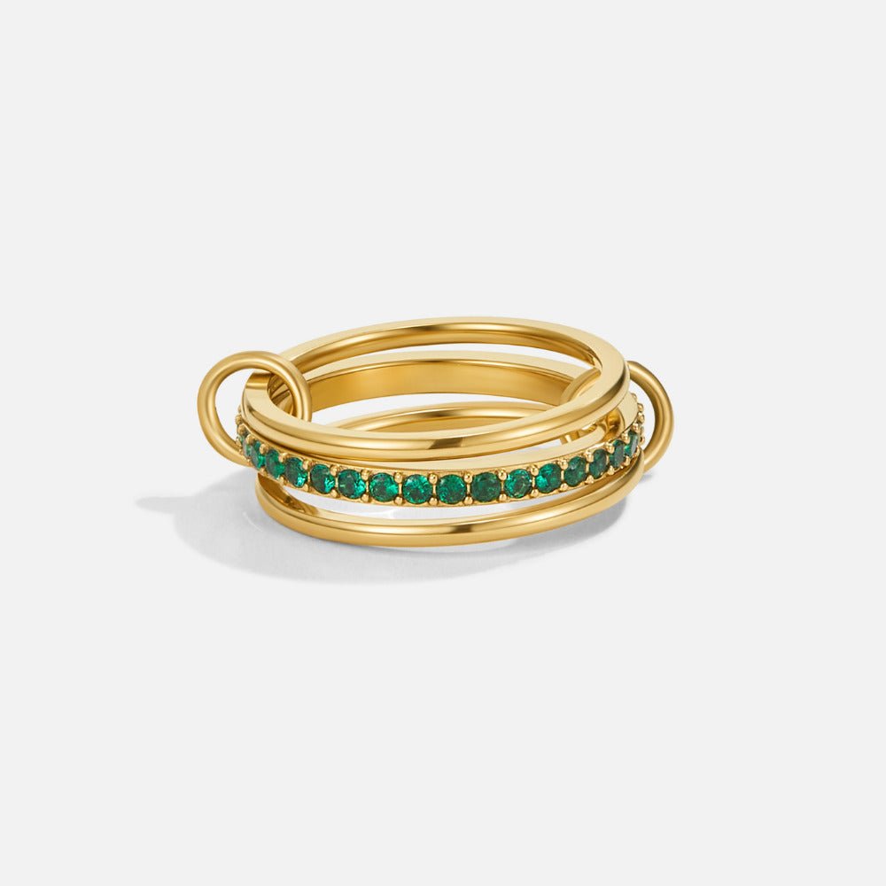 Layered Kaili Green Crystal Ring, stacked gold rings linked together, with a row of green stones