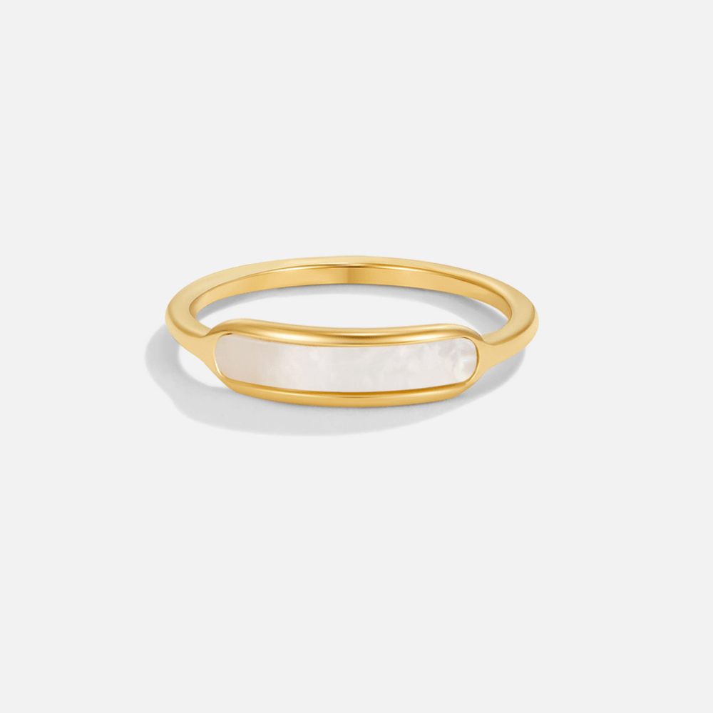 Maya Pearl White Ring, gold band with a curved white mother-of-pearl bar on a plain background