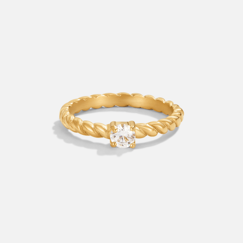 Milan Twisted Gold Crystal Ring, gold twisted-band ring with a round clear stone, on white