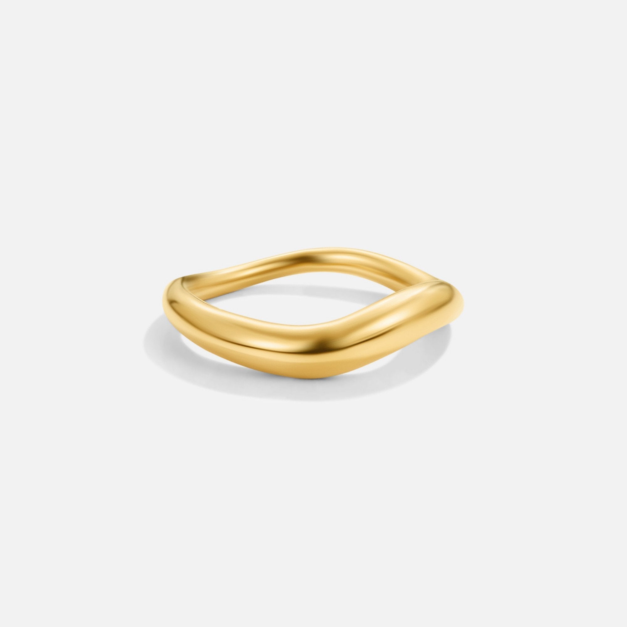 Mina Gold Wave Ring, polished gold ring with a wavy band on a plain white background