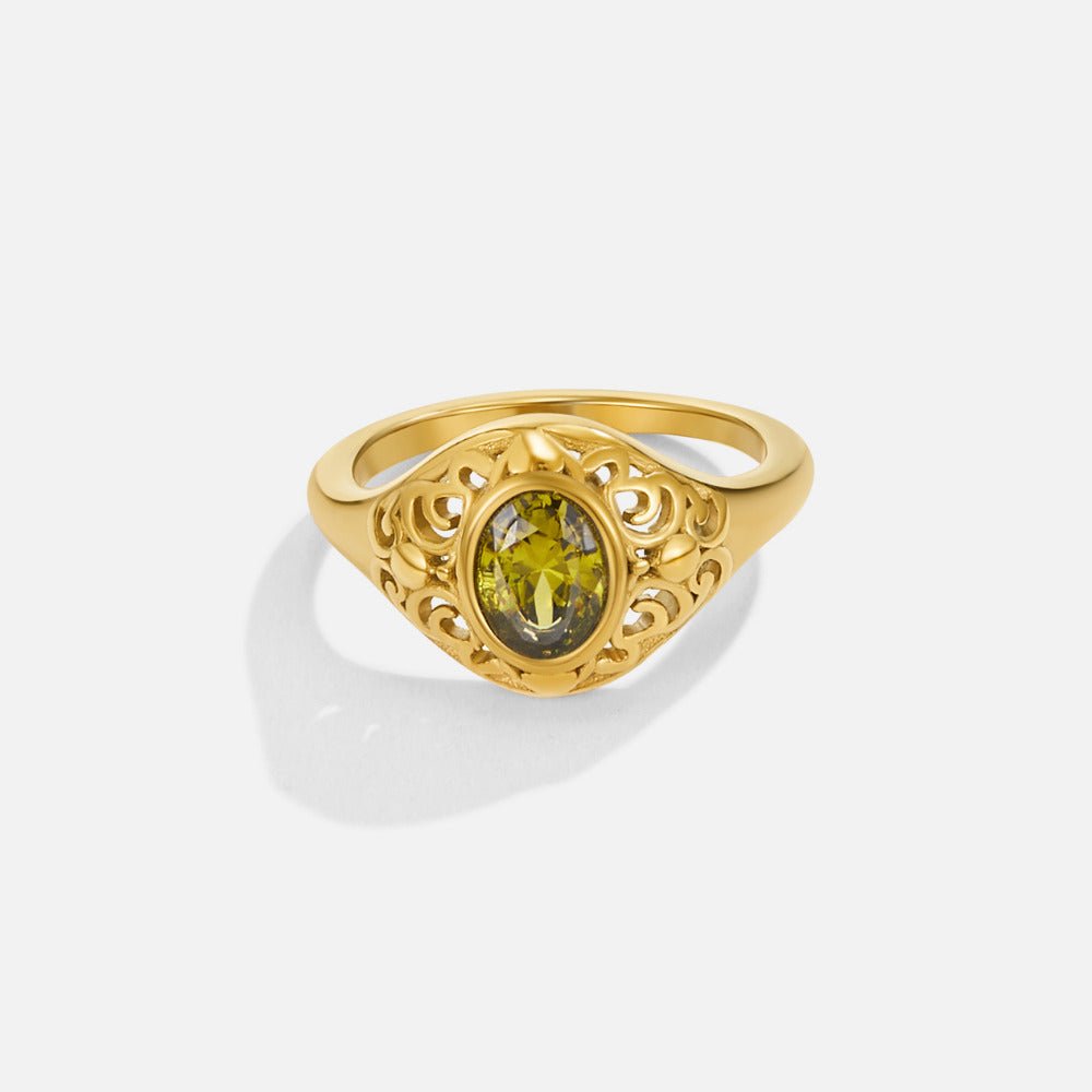 Mystic Emerald Gold Ring, gold ring with filigree scrollwork and an oval green stone, on white