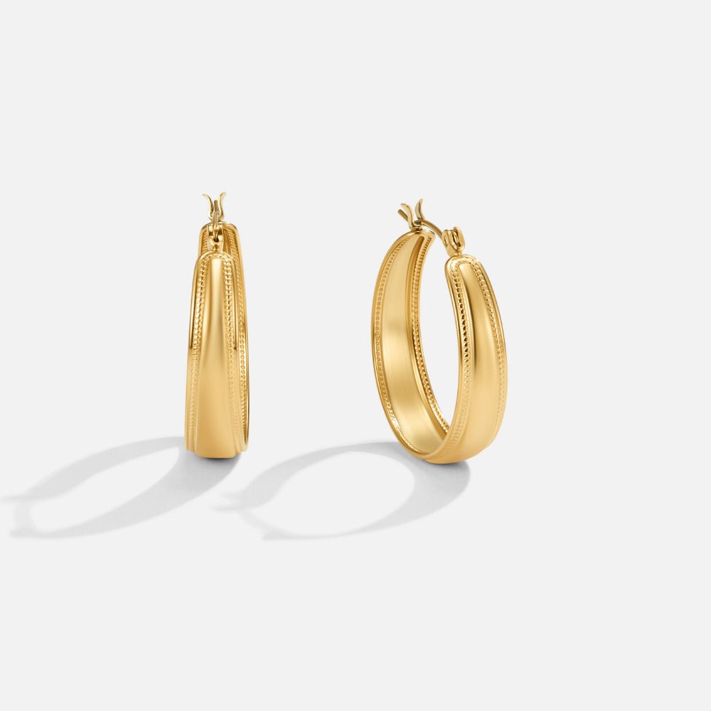 Orelia Gold Hoop Earrings, pair of gold hoops on white background, one angled edge-on