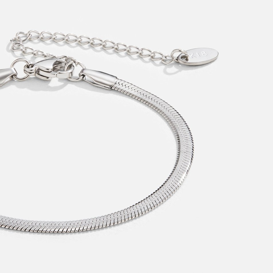 Sarya Snake Chain Silver Bracelet, close-up of a flat silver snake chain with clasp and extender