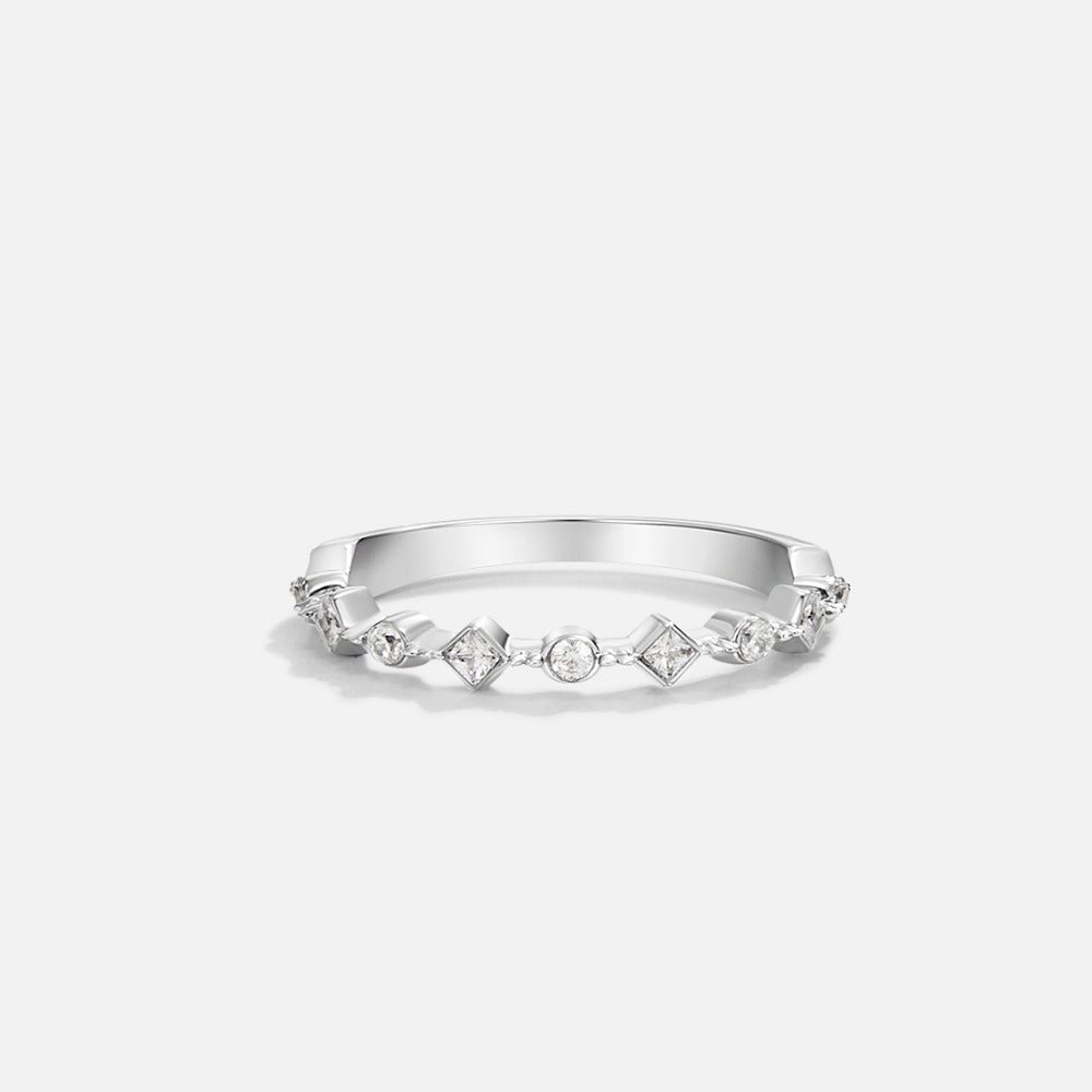 Silver Milana Crystal Ring, ring lying flat on white background, silver band with clear stones