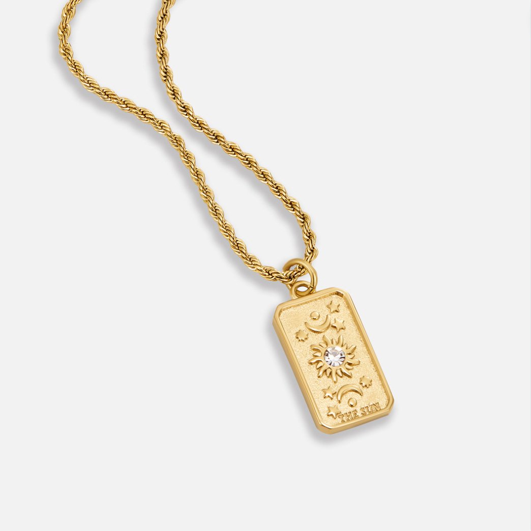 βThe Sunβ Tarot Pendant Necklace, gold rope chain with rectangular tarot-card pendant on white