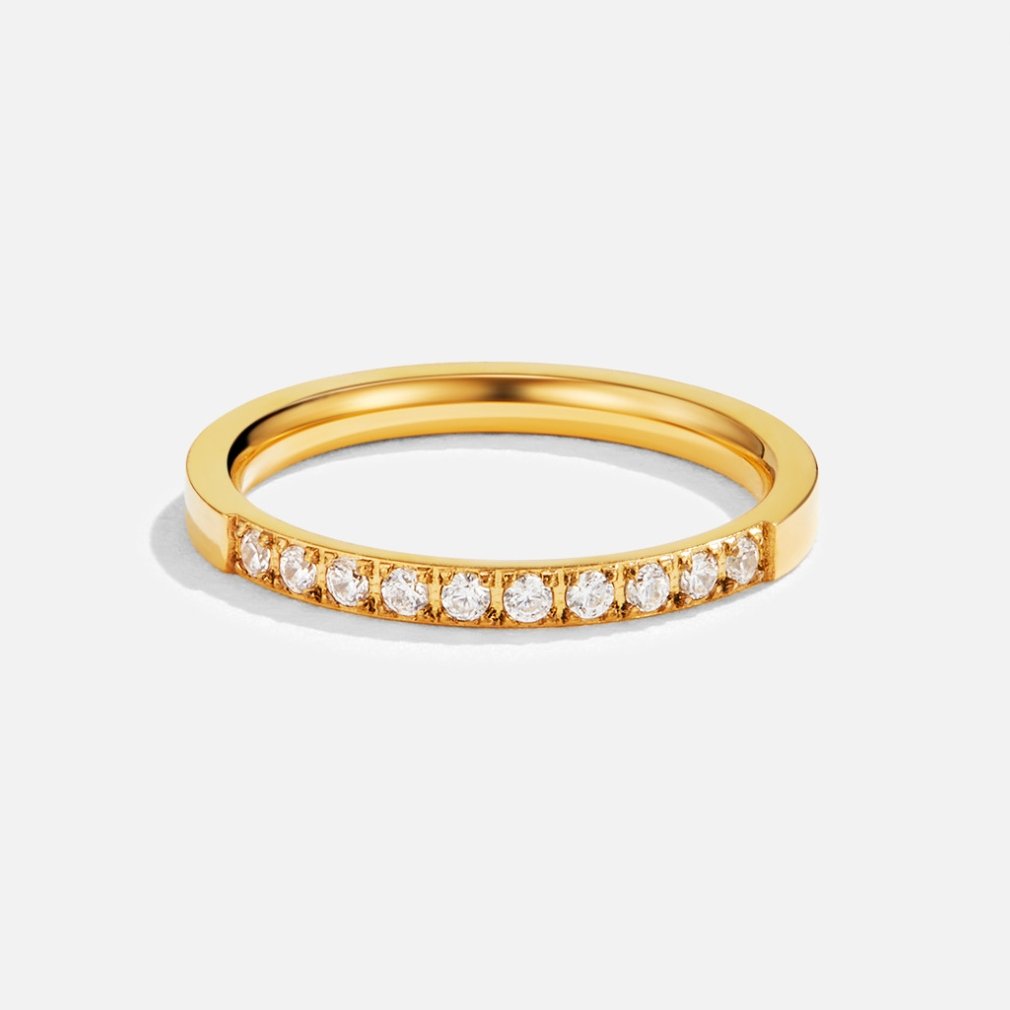 Timeless Beauty 18K Crystal Ring, gold band ring standing upright with a row of small clear