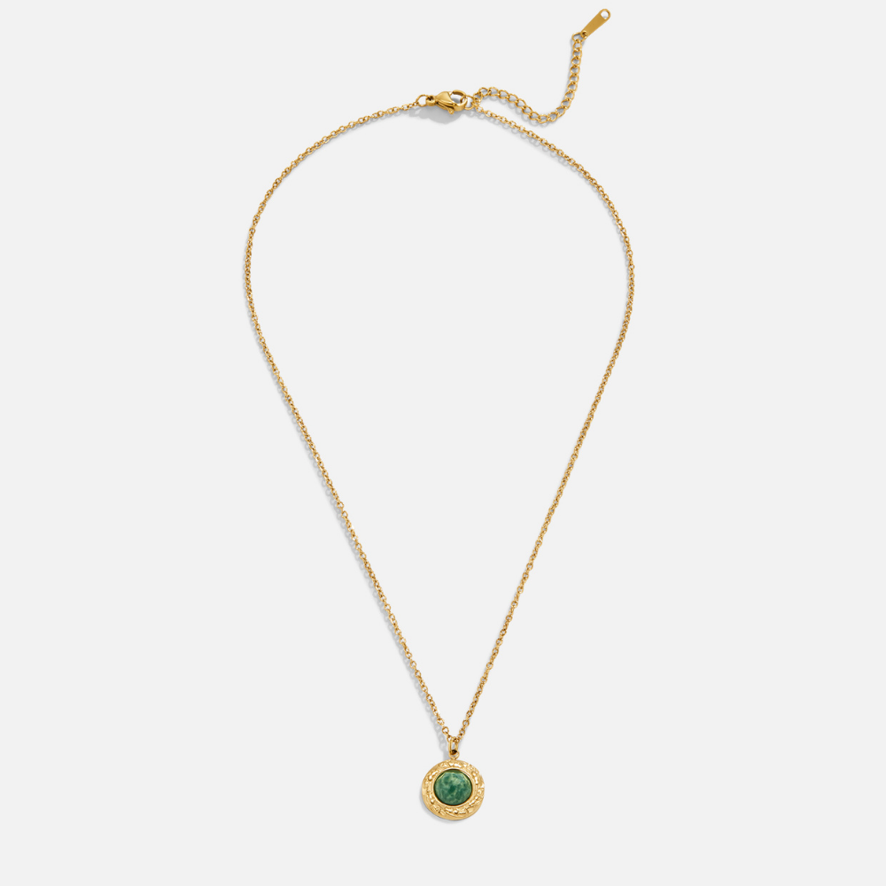 Green Aventurine Coin Necklace, flat lay of a gold chain with a round green stone pendant