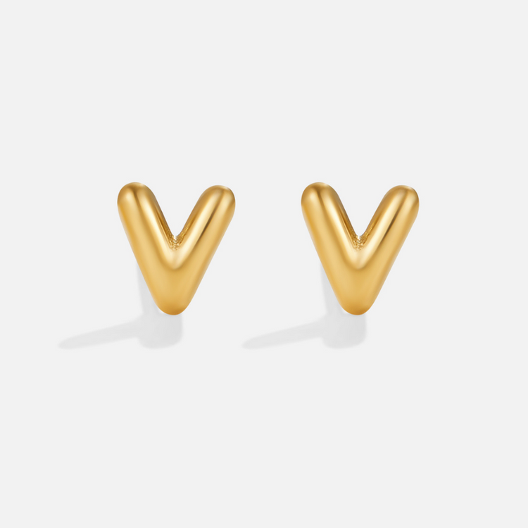 Gold Bubble Letter Earrings, pair of polished gold V-shaped stud earrings on white background