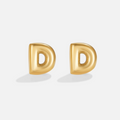 Gold Bubble Letter Earrings, pair of polished gold puffy letter D studs on white background