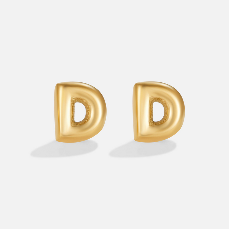 Gold Bubble Letter Earrings, pair of polished gold puffy letter D studs on white background