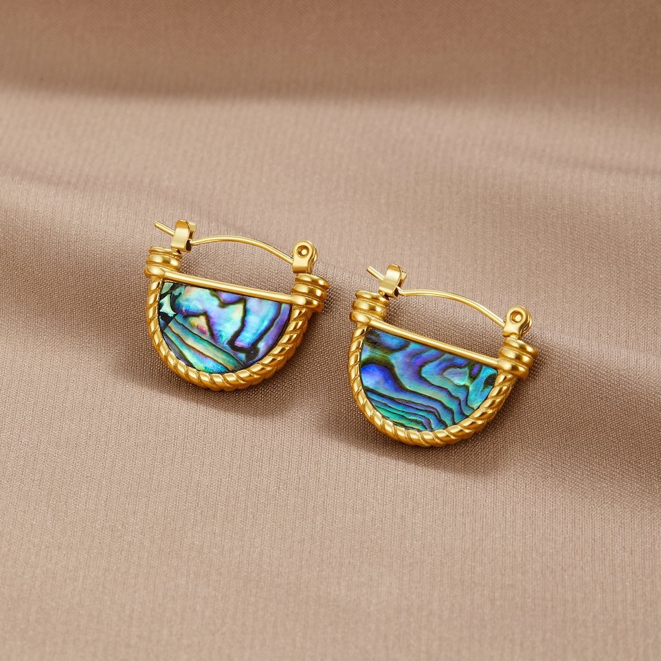 Amalfi Turquoise Shell Earrings, a pair of gold hoops with iridescent blue abalone shell