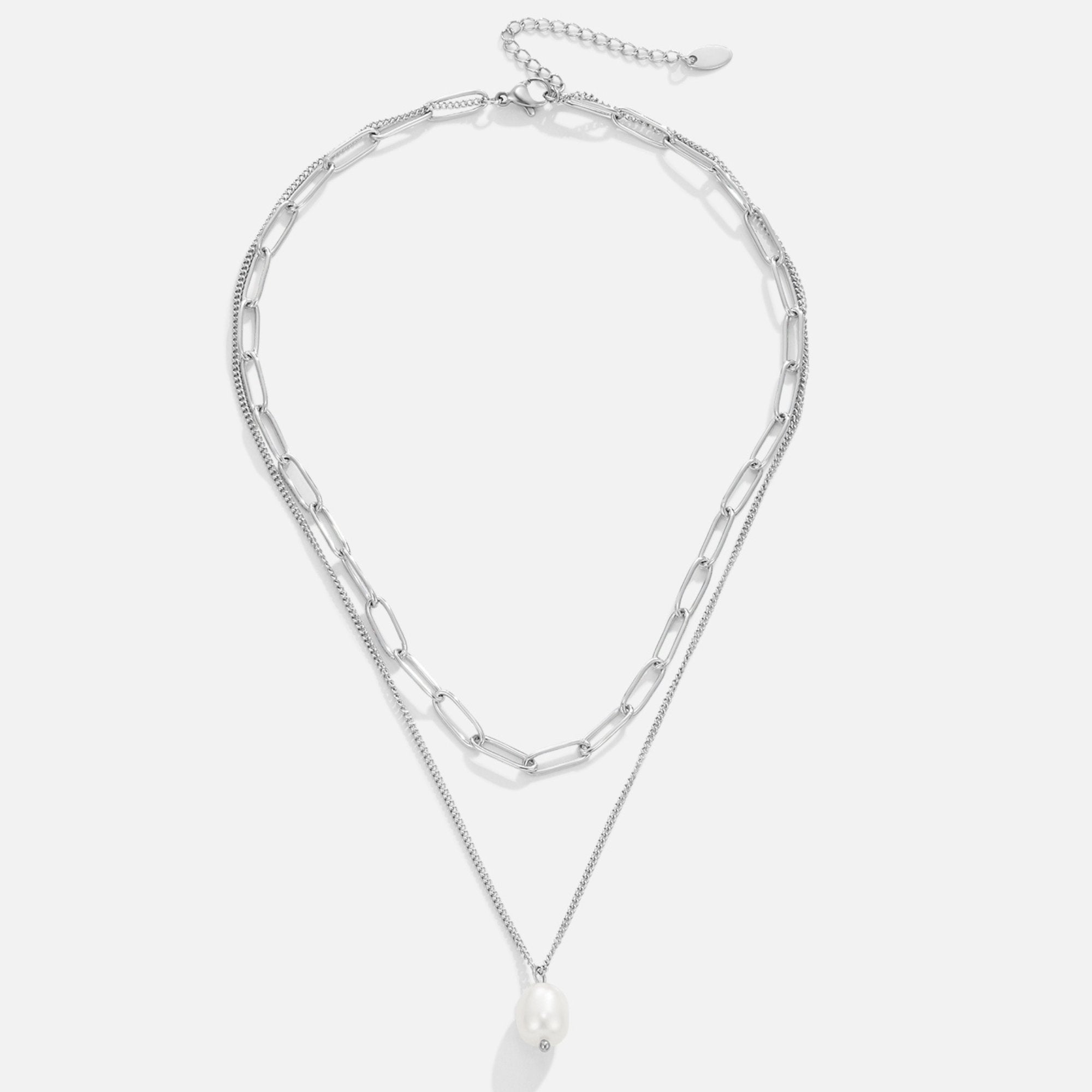 Angela Pearl Silver Necklace, flat lay of a two-strand silver chain necklace with a pearl pendant