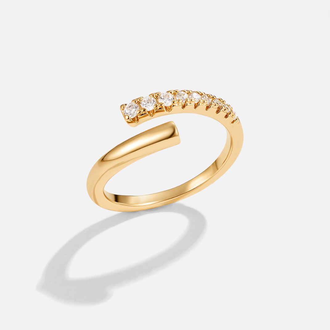 Arya Gold & Crystal Wrap Ring, open gold wrap ring with a row of small clear stones, on white