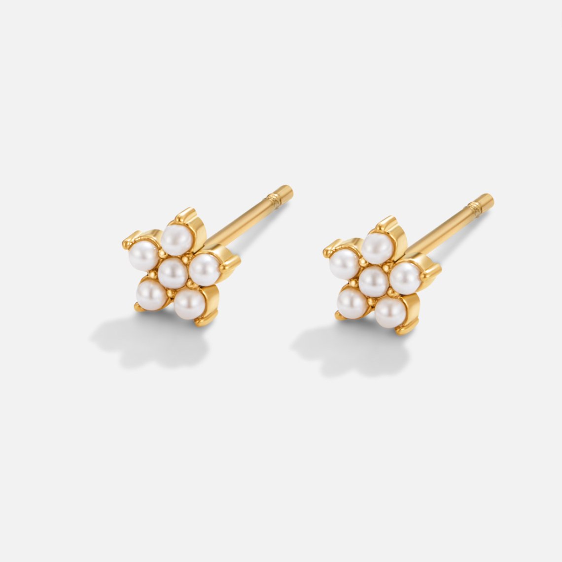Blooming Flower Pearl Earrings, pair of gold stud earrings with small white pearls in flower shapes