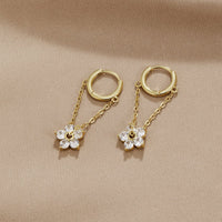 Blooming Petal Crystal Earrings, pair of gold hoops with chains and crystal flower drops on