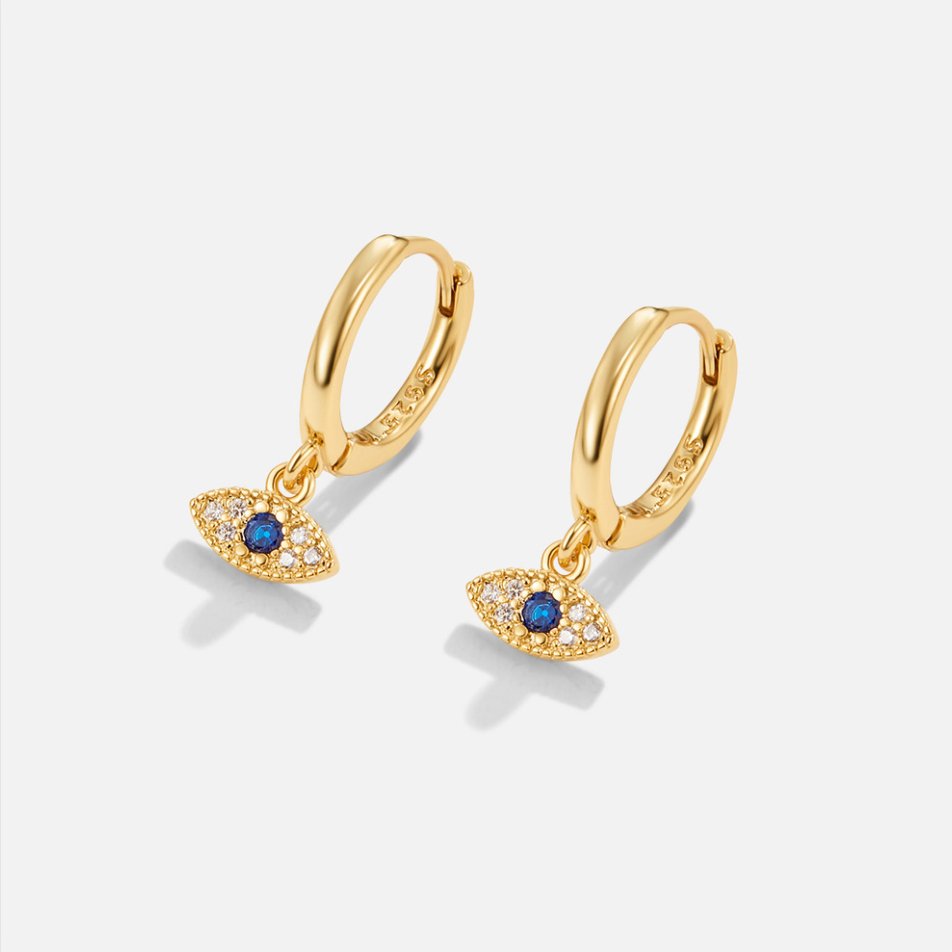 Blue Evil Eye Drop Earrings, pair of gold hoop earrings with evil eye charms on white