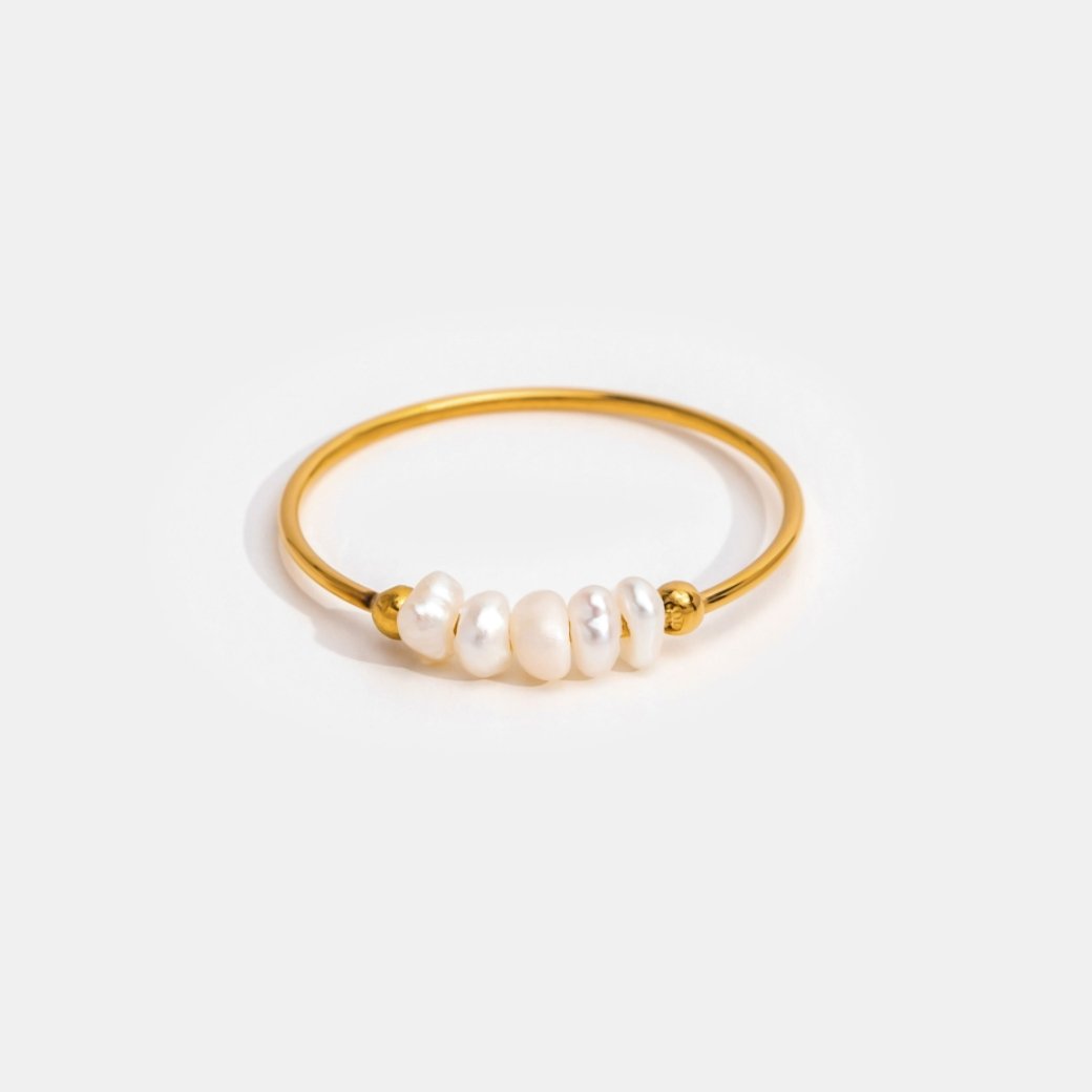 Classic Freshwater Pearl Ring, gold band ring with five pearls on a white background