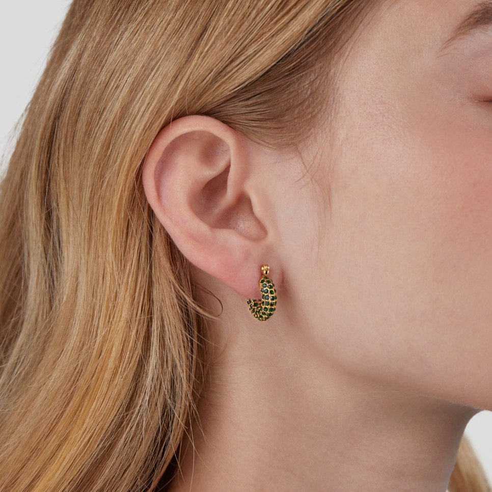 Emerald Beauty Hoop Earrings, worn on an ear, pavé green stones with gold post