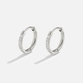 Eternity Hoop Earrings, pair of silver hoops with a row of small clear stones on one side