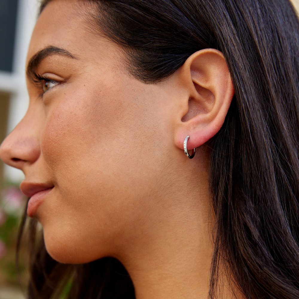 Eternity Hoop Earrings, worn on an ear, side profile, small hoop with clear stones