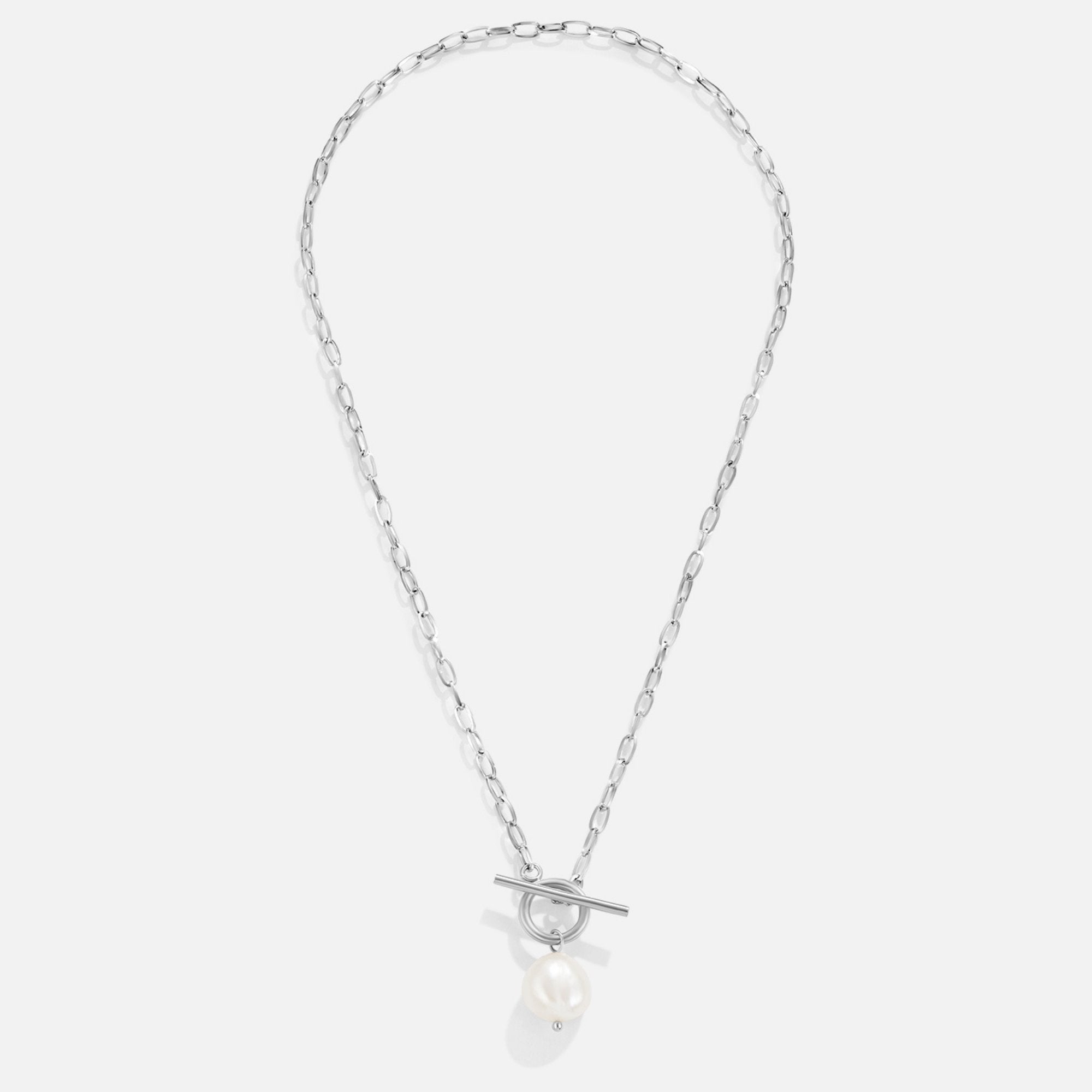 Eva Freshwater Pearl Silver Necklace, flat lay of silver chain with toggle clasp and pearl drop
