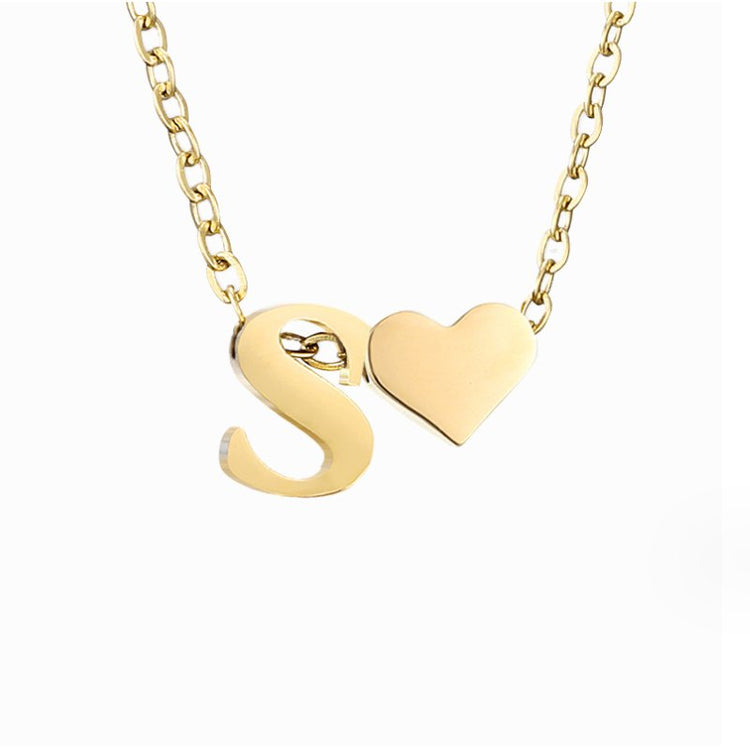 Forever Love & Letter Gold Necklace, close-up on white background, gold letter S and heart