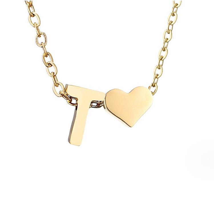Forever Love & Letter Gold Necklace, gold chain with a letter T pendant beside a heart, on white