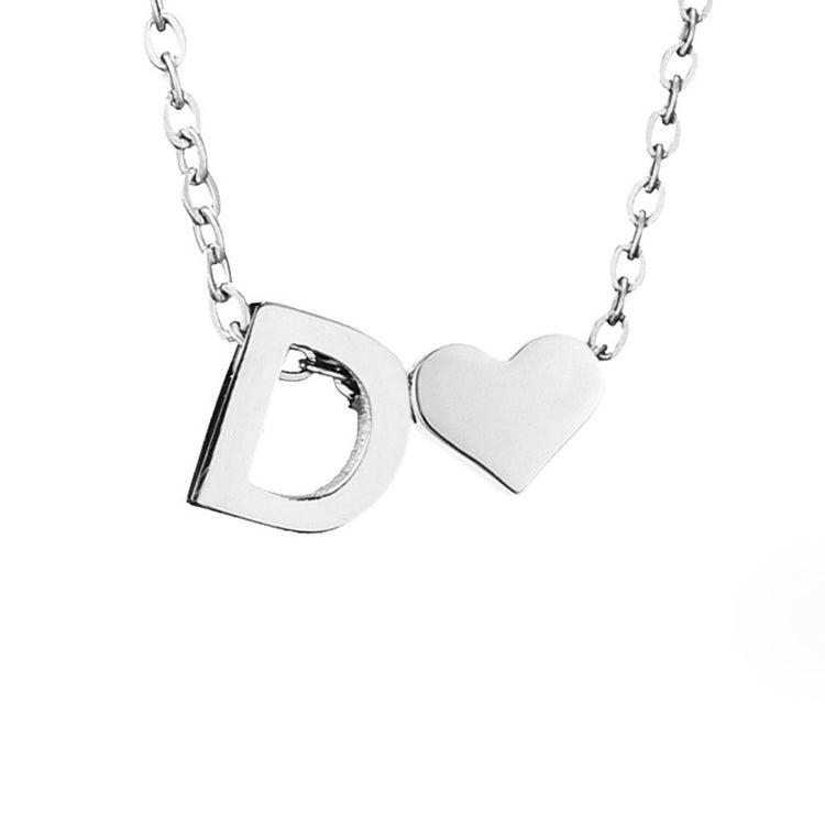 Forever Love & Letter Silver Necklace, close-up of a silver letter D pendant beside a heart on a fine chain