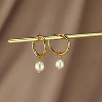 Freshwater Pearl Bella Hoop Earrings, pair of gold hoops with pearl drops, hung on a gold rod