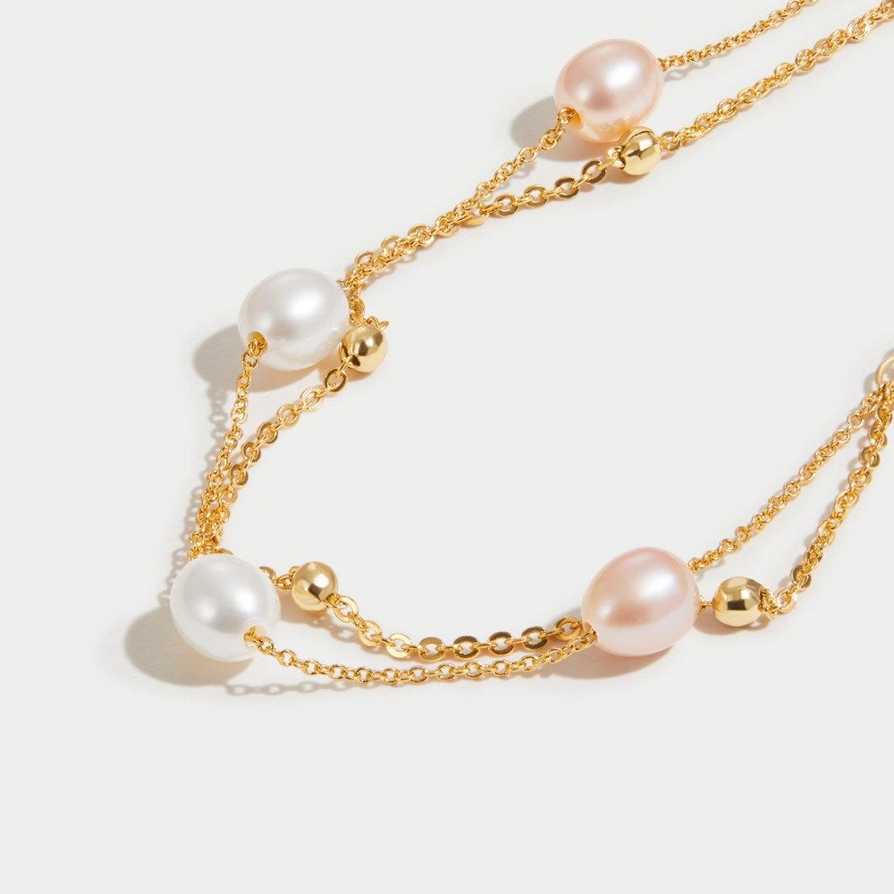 Freshwater Pearl Layered Bracelet, close-up of double gold chain with white and pink pearls