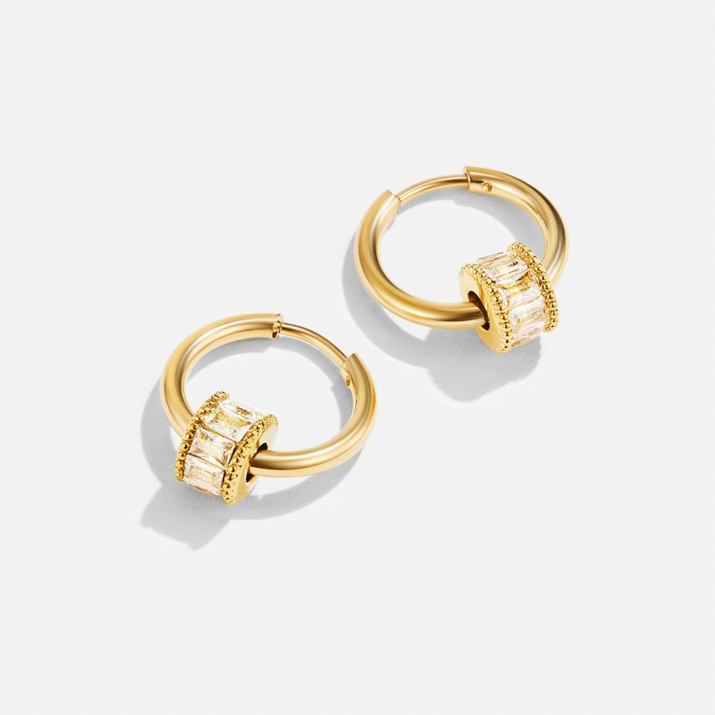 Gigi Crystal 18K Gold Hoop Earrings, pair of gold hoops with clear baguette-stone rings on