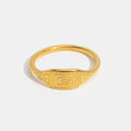 Gold Adaline Ring, gold ring on white background with engraved geometric face
