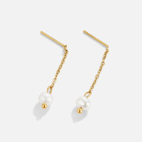 Gold Maria Pearl Drop Earrings, pair of gold chain drop earrings with pearls, on plain background