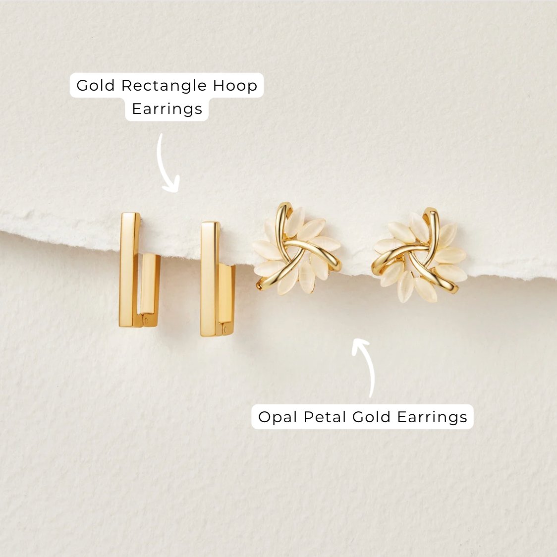 Gold Rectangle Hoop Earrings, two gold rectangle hoop earrings lying on white paper, with opal
