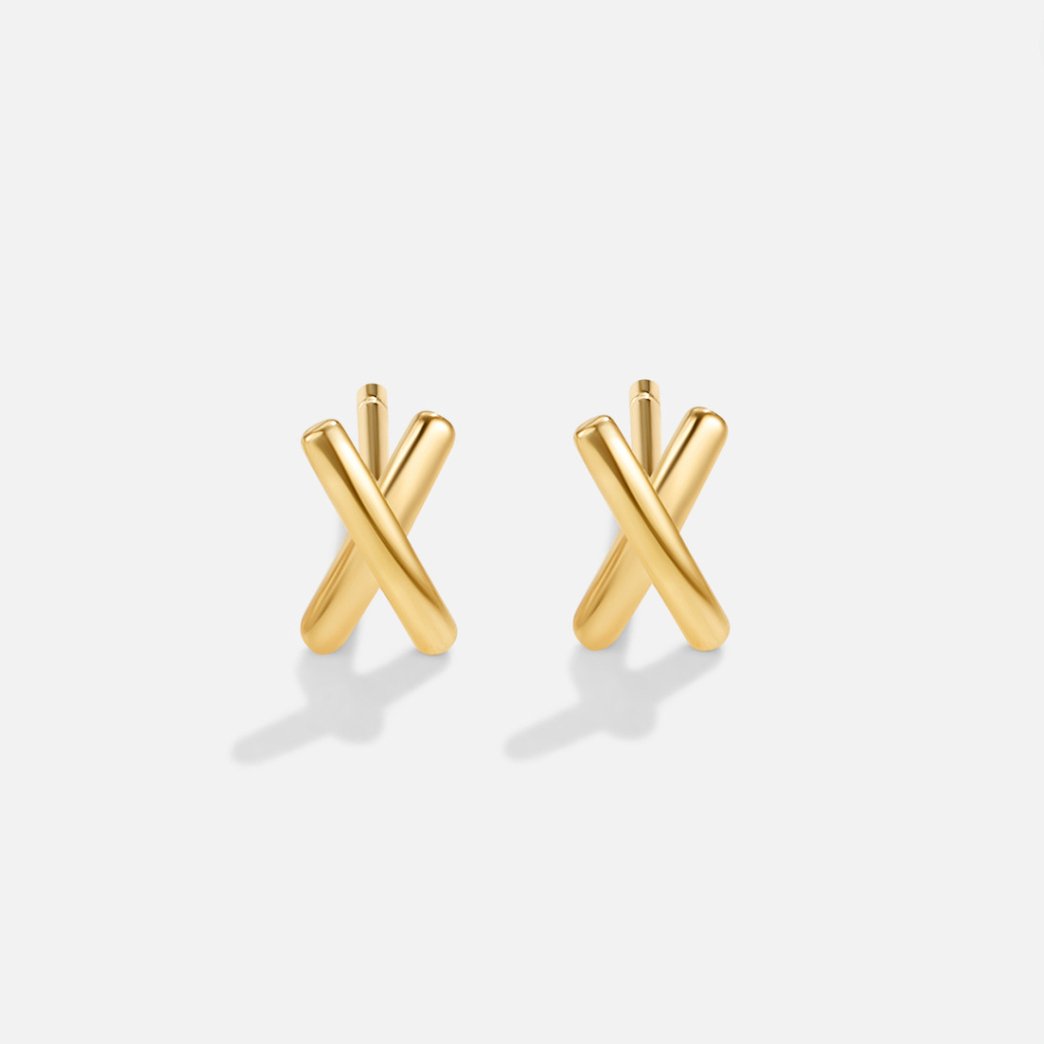 Graffiti X Stud Earrings, pair of gold crossed-stick stud earrings on a plain white background
