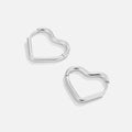 Heart Silver Hoops, pair of heart-shaped silver hoop earrings on a plain white background